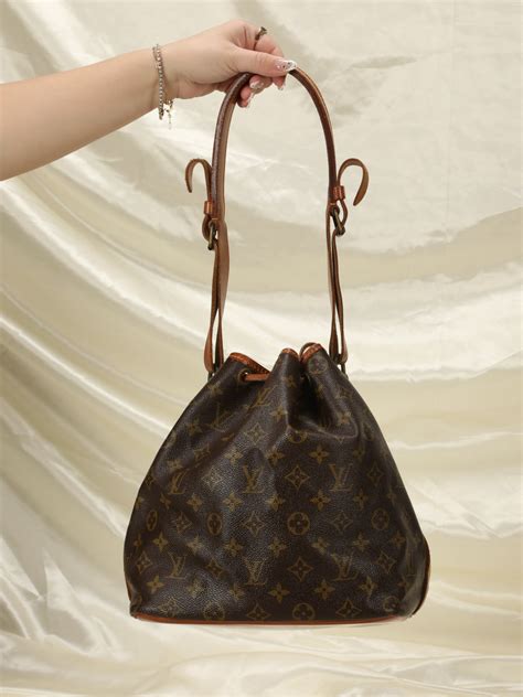 louis vuitton bucket bag black|Louis Vuitton drawstring bucket bag.